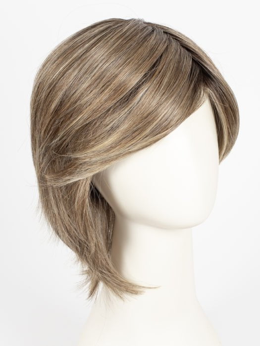 Raquel Welch Black Tie Chic wig in RL12/22SS Shaded Cappuccino, shown on a mannequin