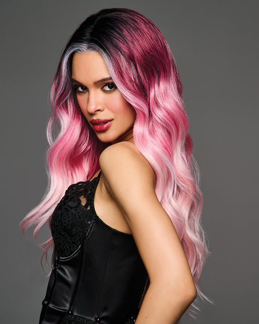 Hairdo Bubblegum Babe long pink wig worn by model, front view