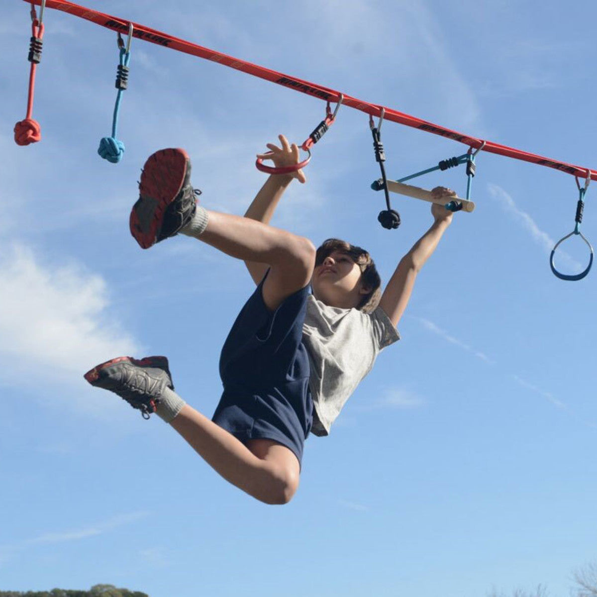Slackers NinjaLine obstacles set up between trees