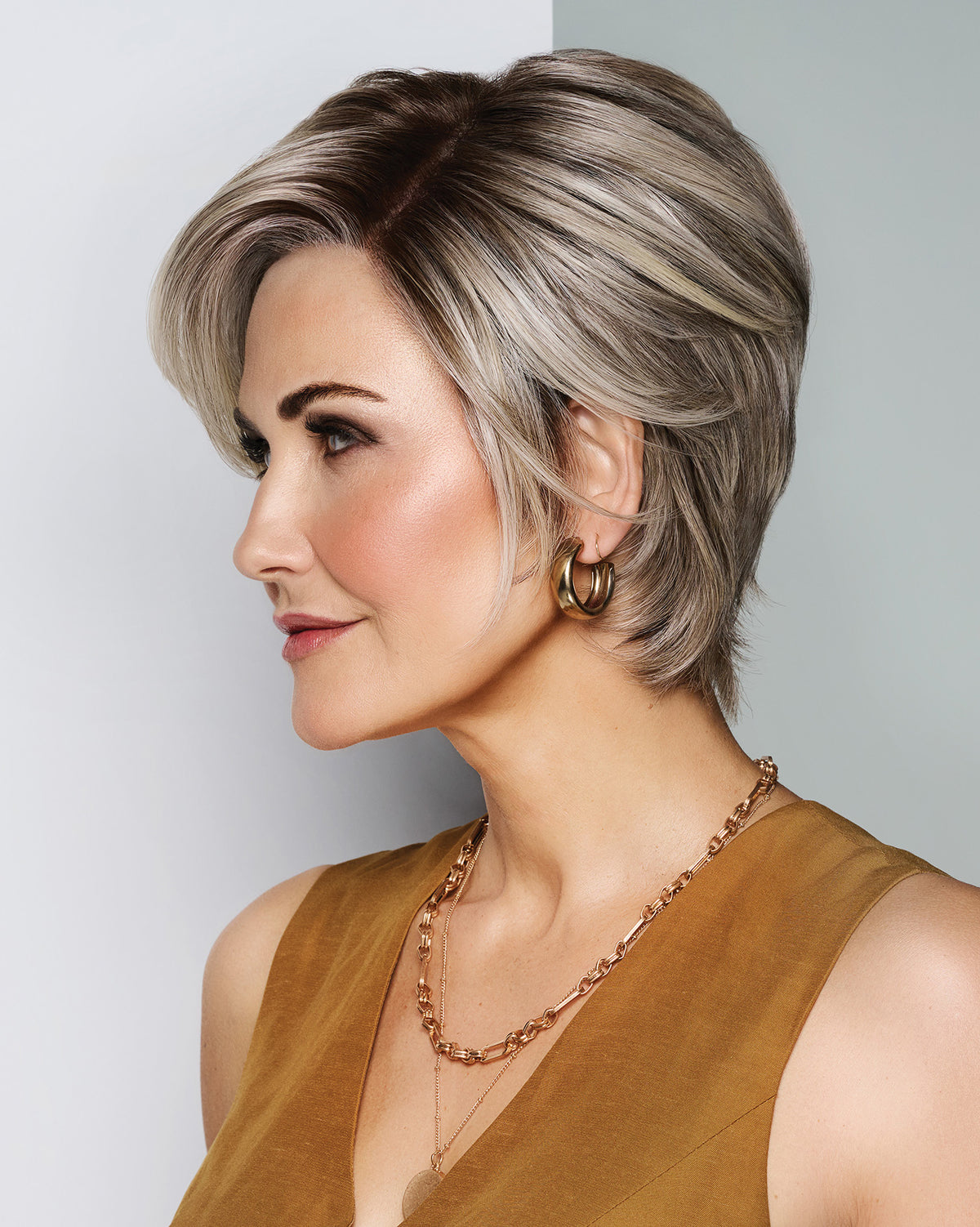 Raquel Welch Posh Premiere short boycut wig, back view on model