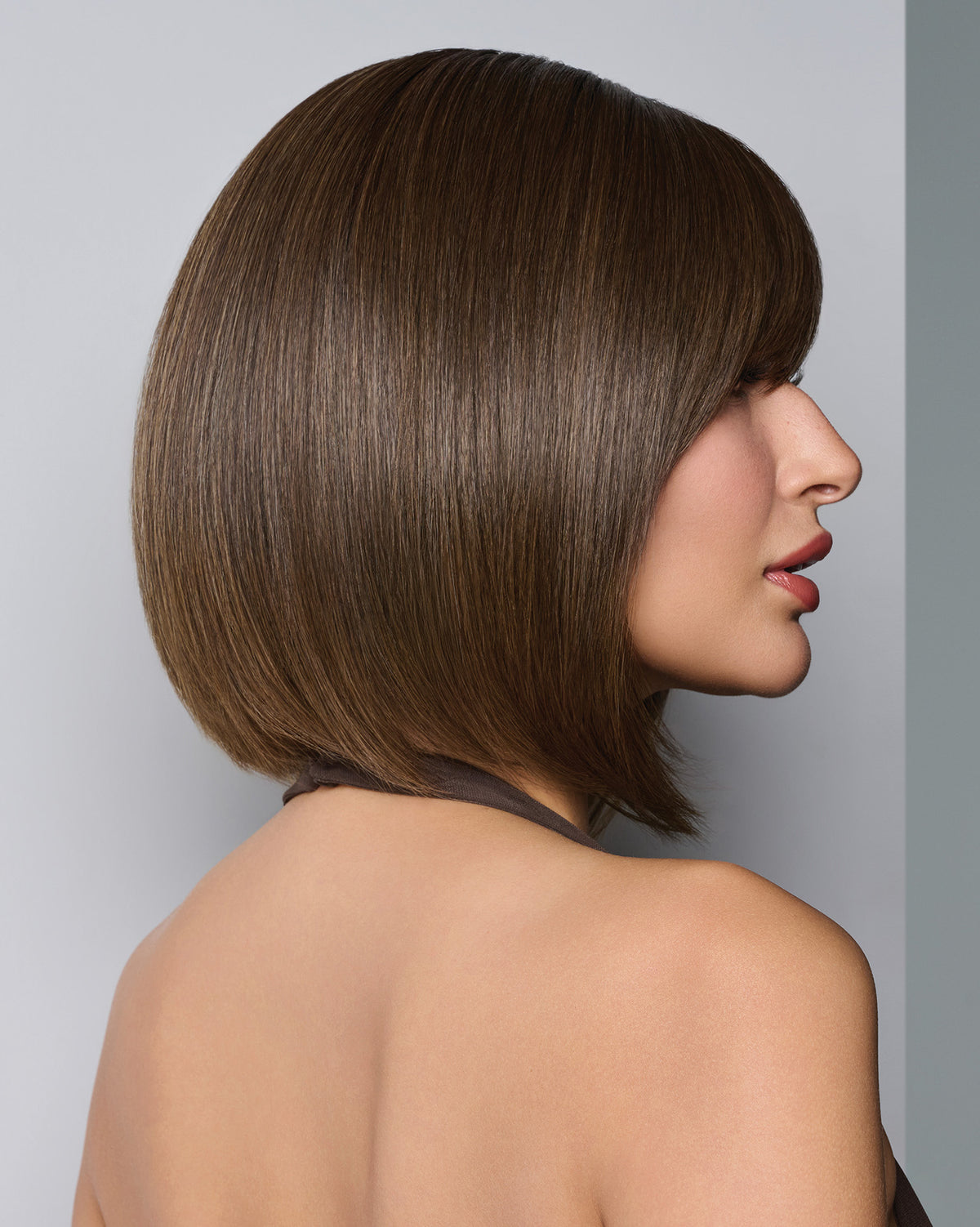 Raquel Welch Straight to Camera wig, side view on model