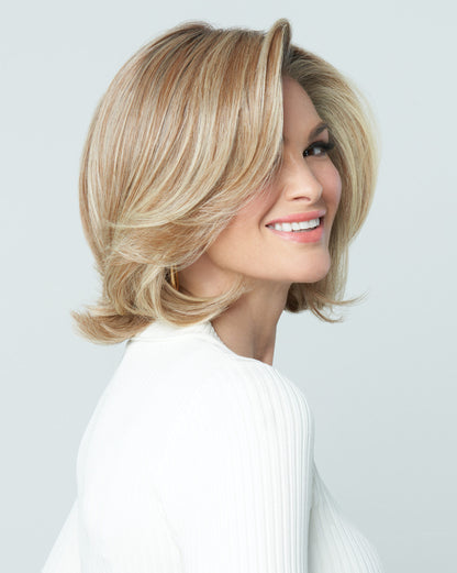 Raquel Welch Untold Story wig, back-side view on model