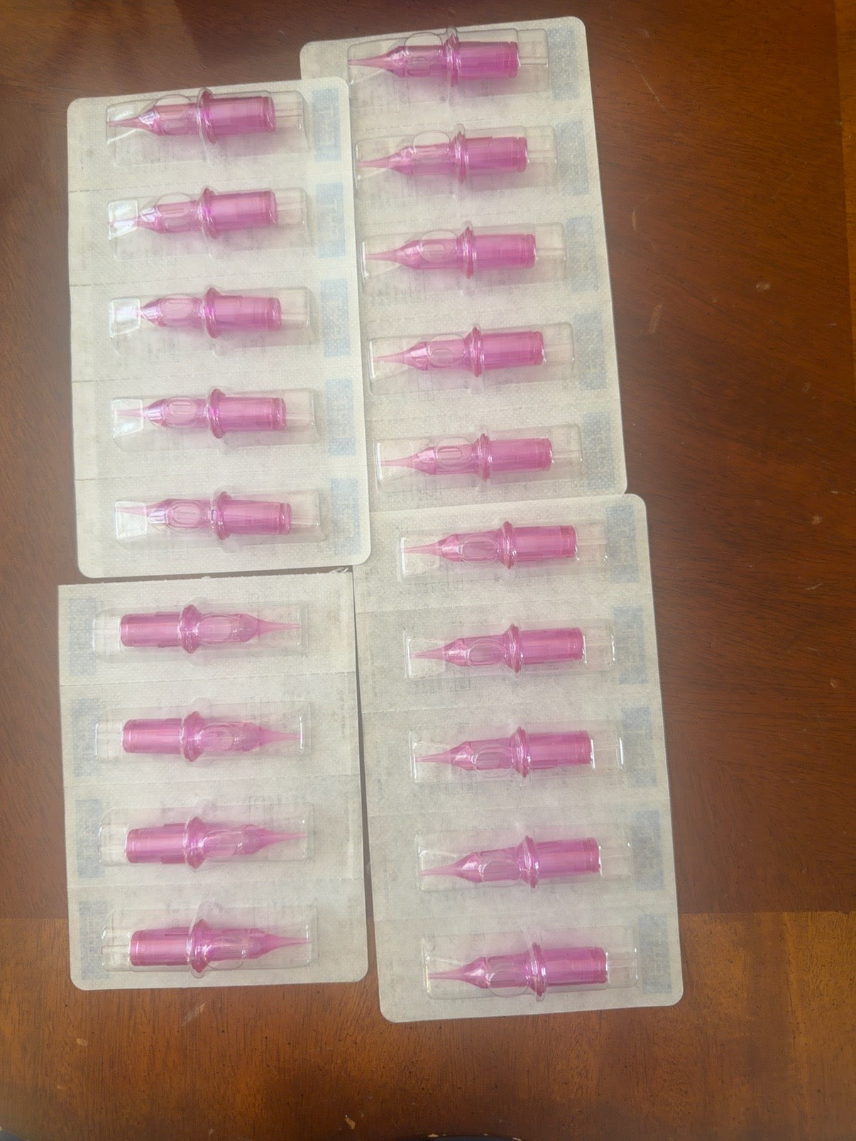 Nineteen individually sealed pink FYT Apex Pro SMP cartridges