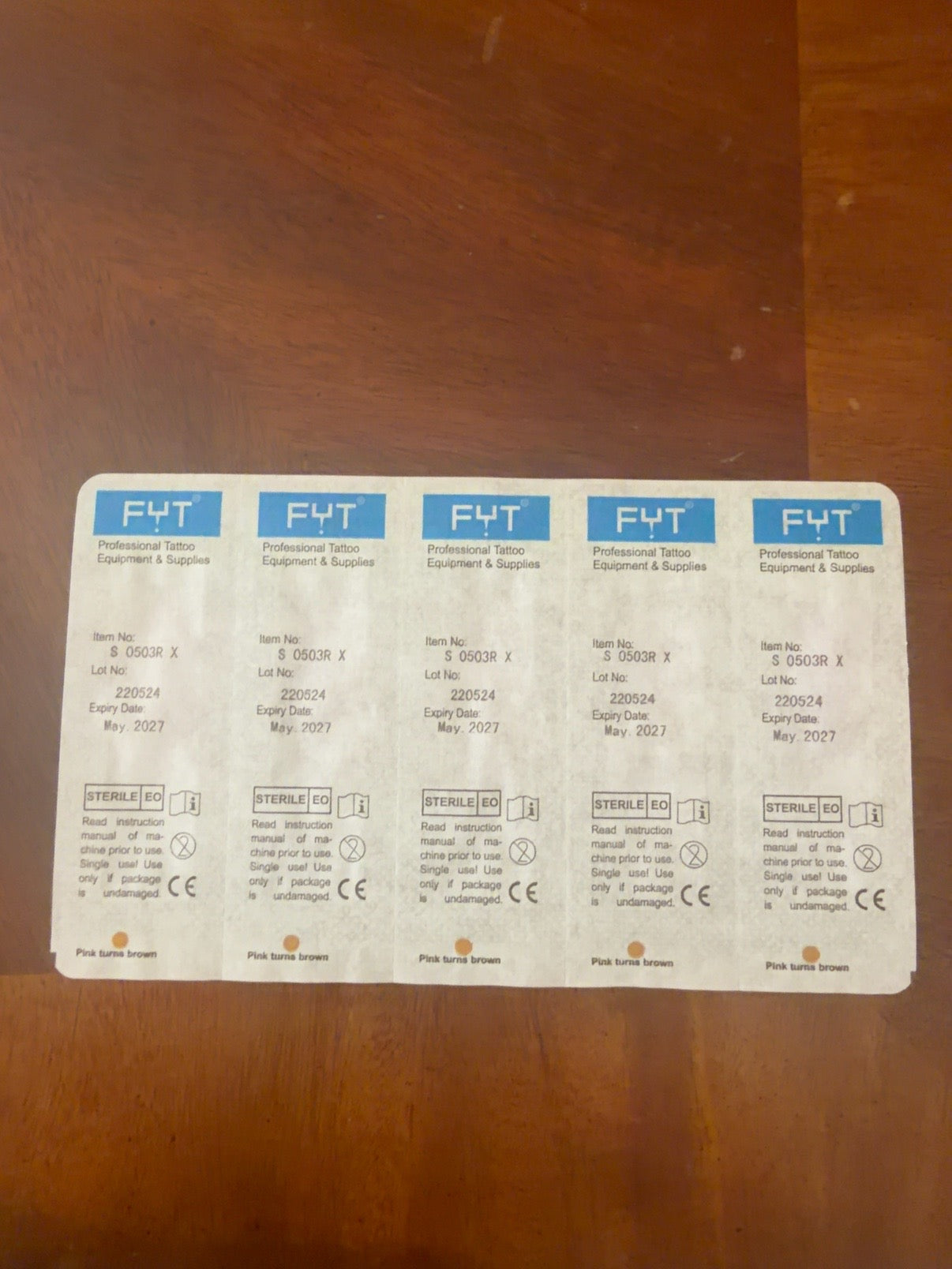 FYT sterile EO cartridge blister labels showing lot 220524 and May 2027 expiration