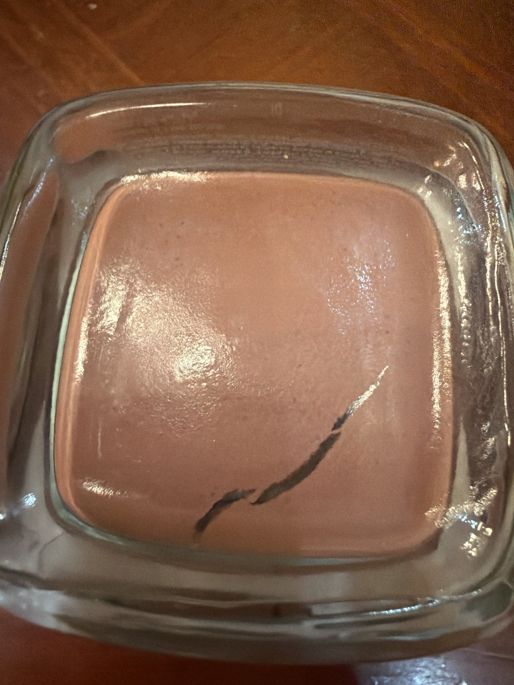 L'Oreal Pure-Clay Mask Red Algae top view showing surface crack