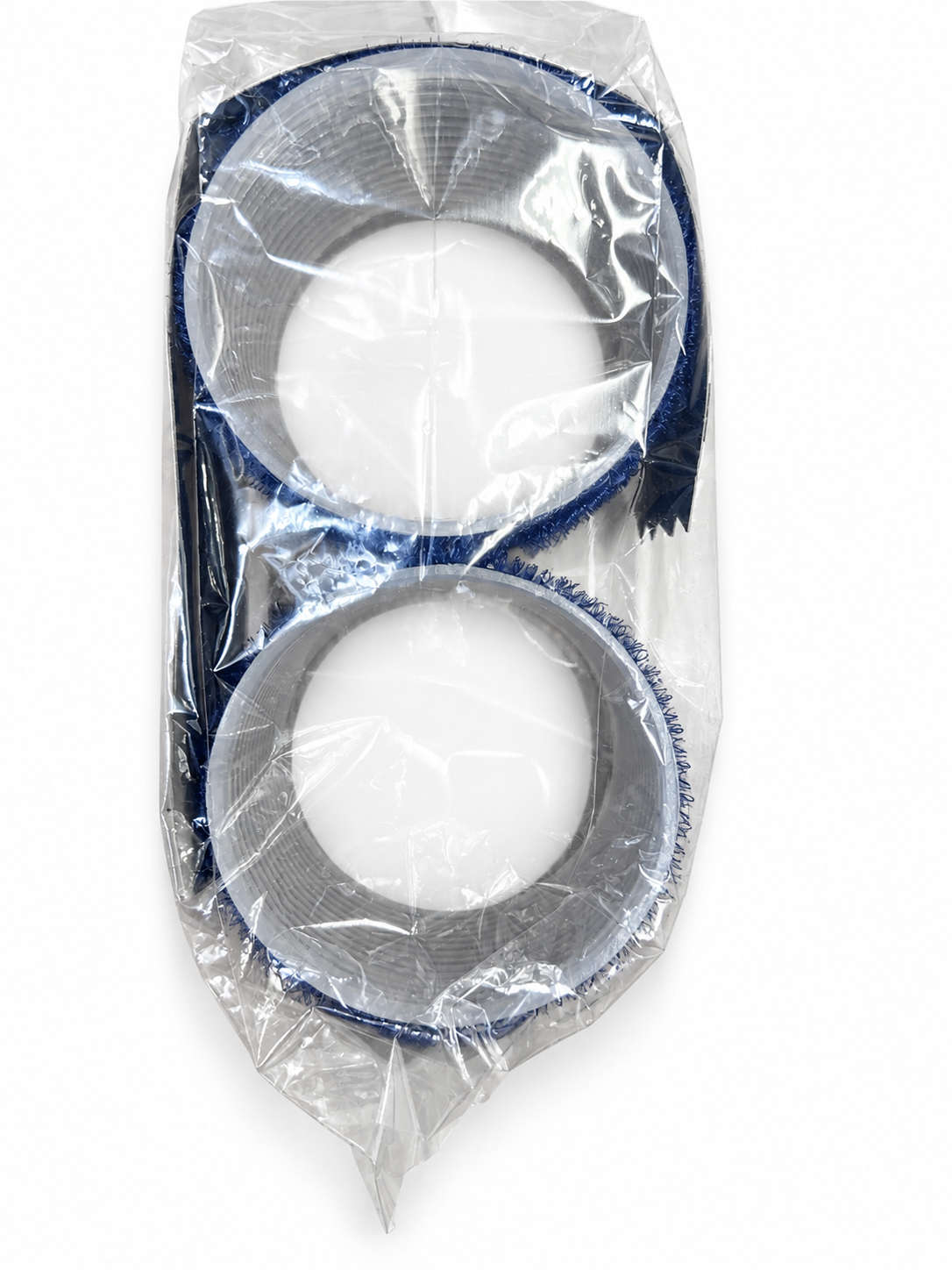 Two Luxor jumbo blue hair rollers showing hollow centers on white background