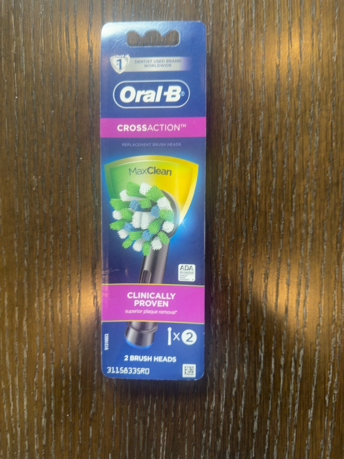Oral-B CrossAction MaxClean black replacement brush heads 2-pack front, UPC 069055127162