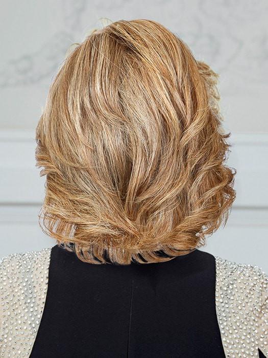 Raquel Welch The Art of Chic human hair wig, back view on model