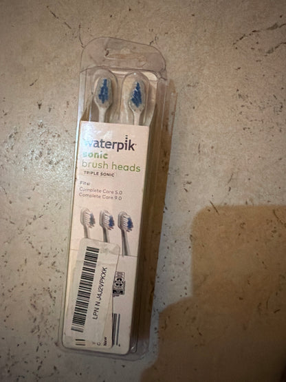 Actual item: Waterpik Triple Sonic STRB-3WW 3-pack with damaged/opened packaging, brush heads sealed